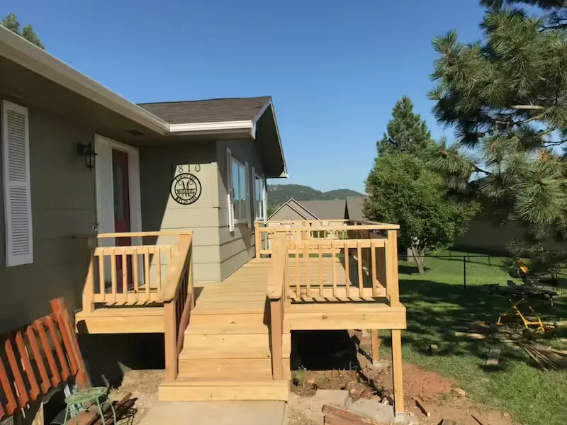 New shingles and powerwashed bridge.